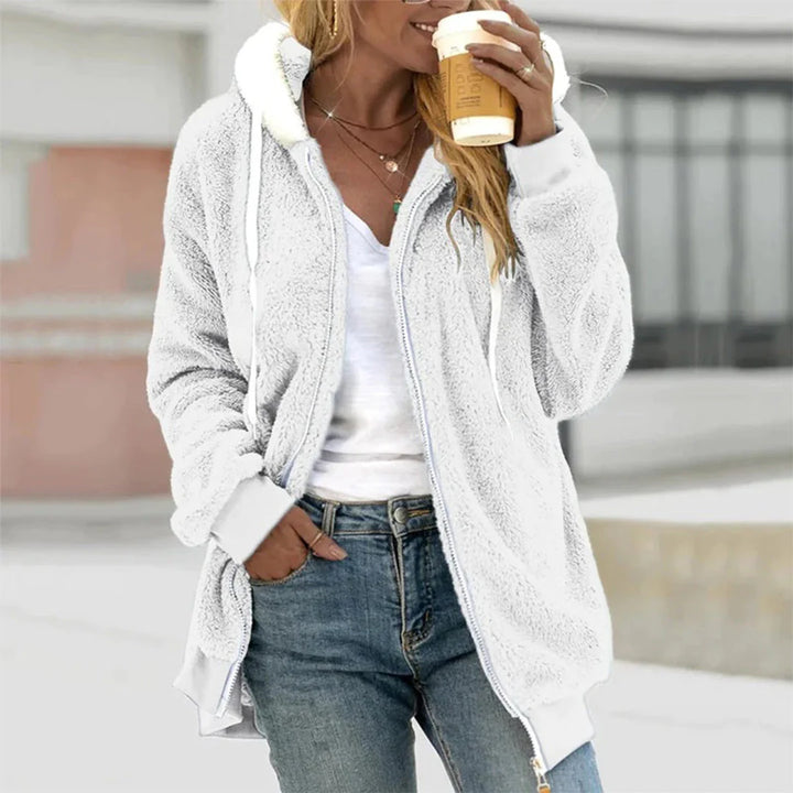 Stylish women's grey zip-up hoodie, ideal for autumn casual wear & active lifestyles.