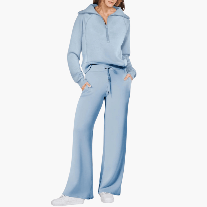 Comfortable women's relaxed fit zip-up hoodie and wide-leg pants lounge set. Ideal for cozy everyday fashion.