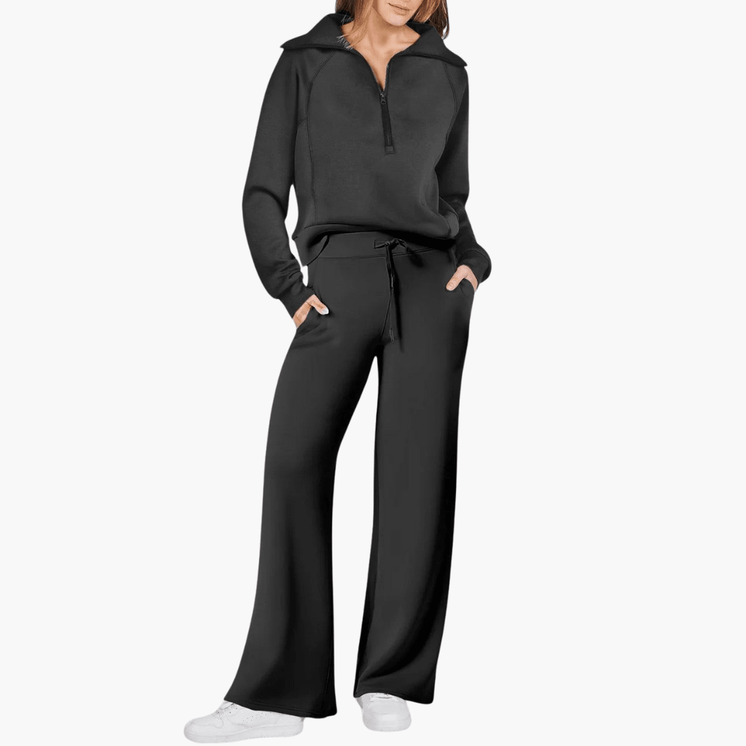 Fashionable women's two-piece lounge set with a zip hoodie and wide-leg pants for ultimate casual comfort.