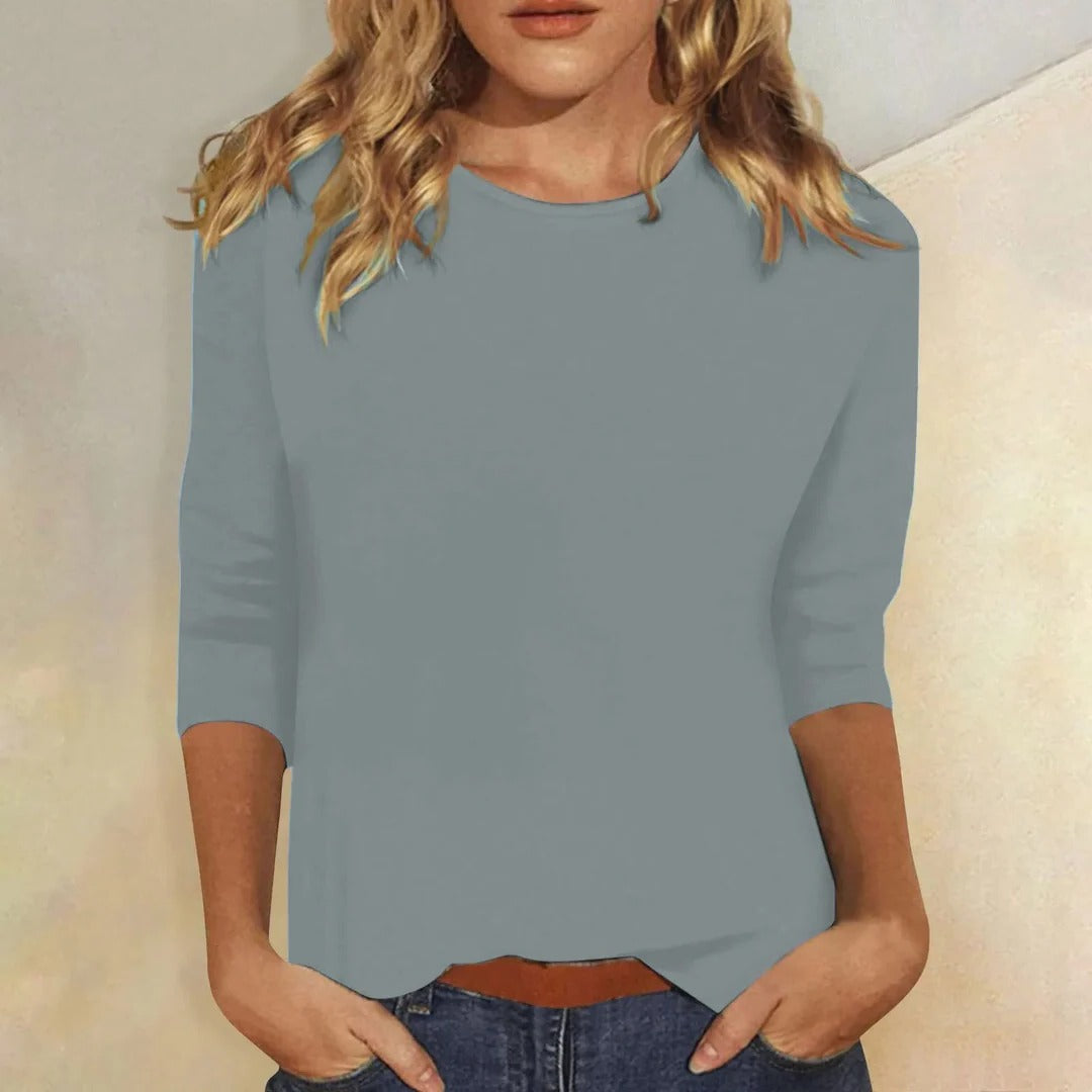 Soft women's 3/4 sleeve relaxed fit top, perfect for casual all-season comfort.