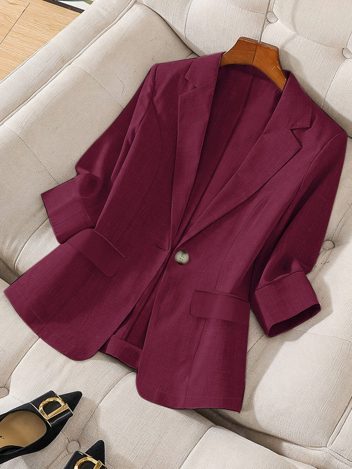 Business casual women's cropped blazer, perfect for a sleek office style.