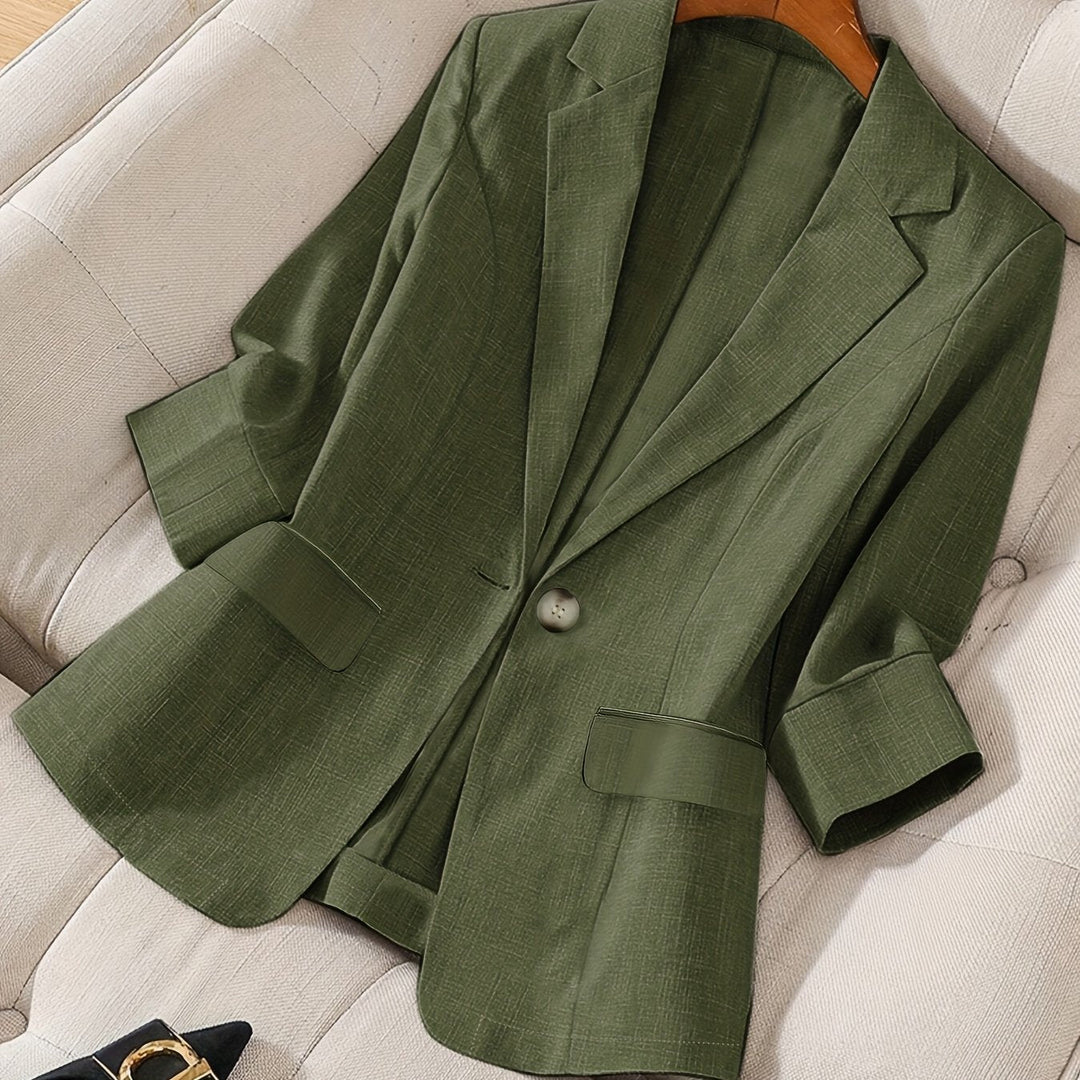 Tailored women's cropped blazer, bringing professional style to the office.