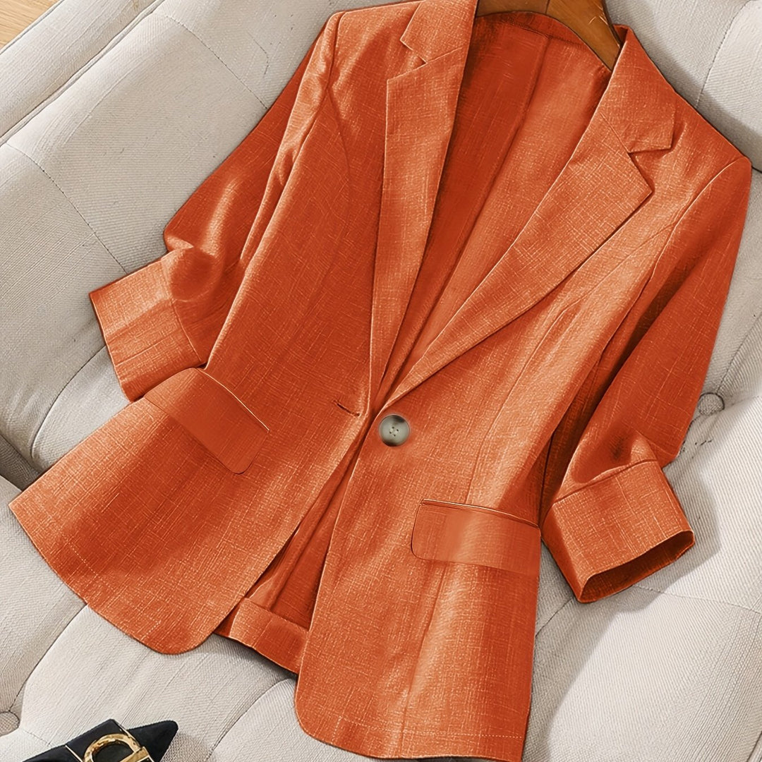 Stylish and professional women's cropped blazer, ideal for business settings.