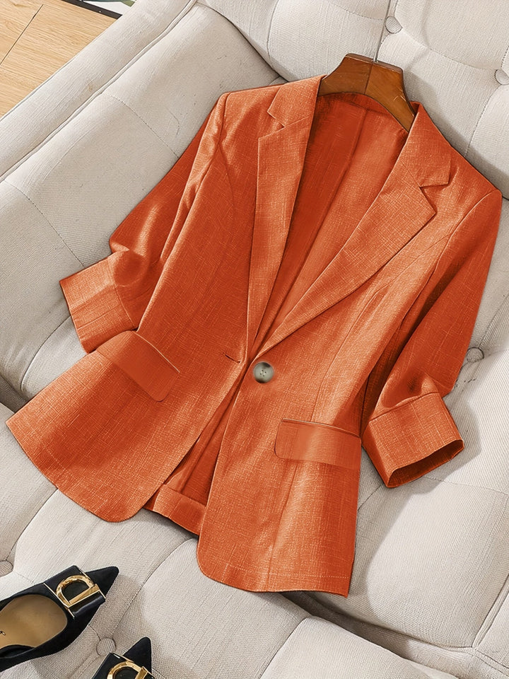 Stylish tailored jacket for women, a versatile three-quarter sleeve design.