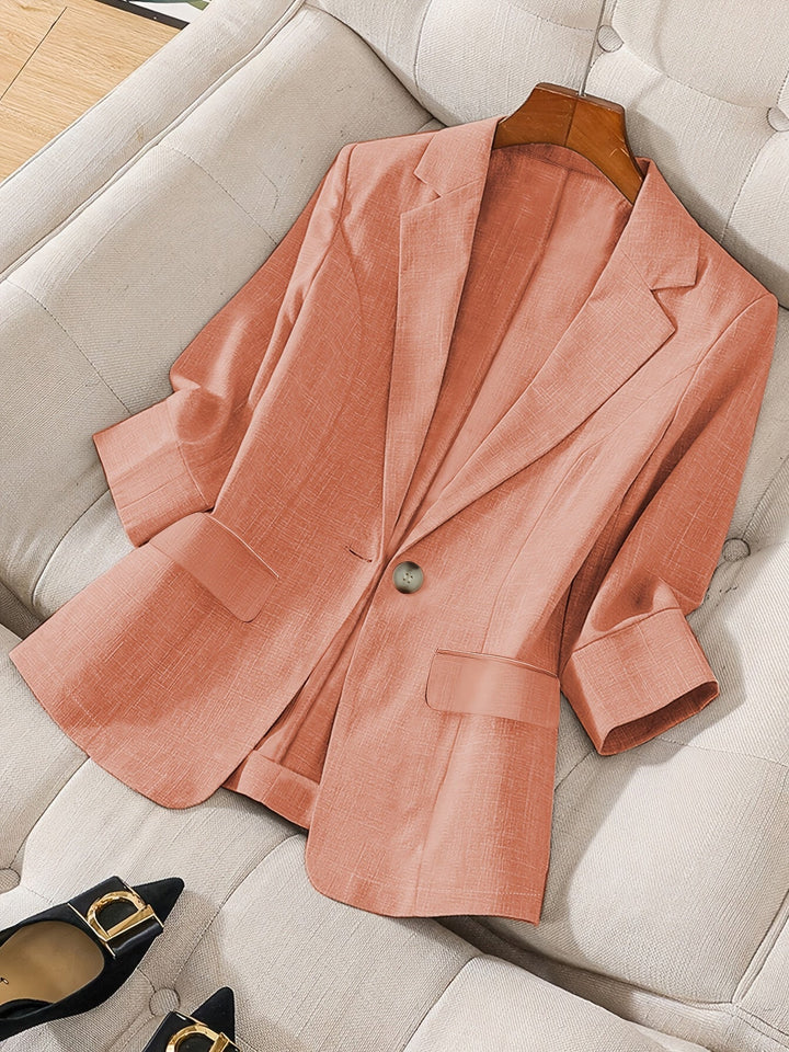 Versatile women's cropped blazer, ideal for business casual outfits.