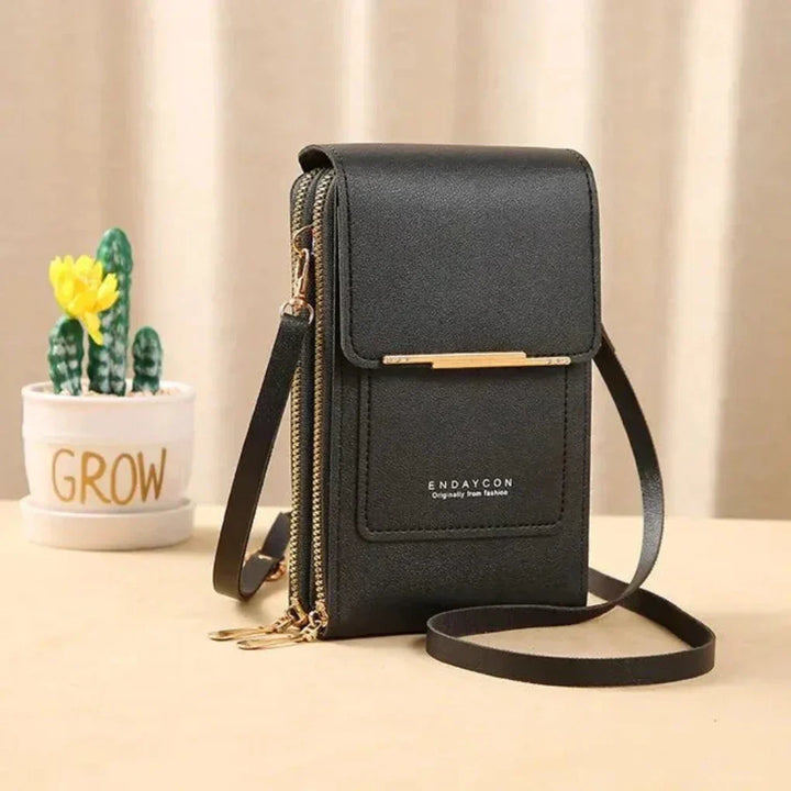 Women's crossbody phone bag with clear touchscreen pocket for easy access.