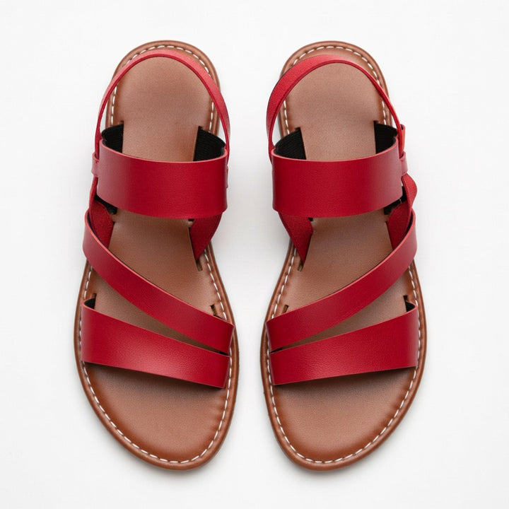 Top view: Women's casual flat sandals, open toe, with chic crossover straps for summer comfort.