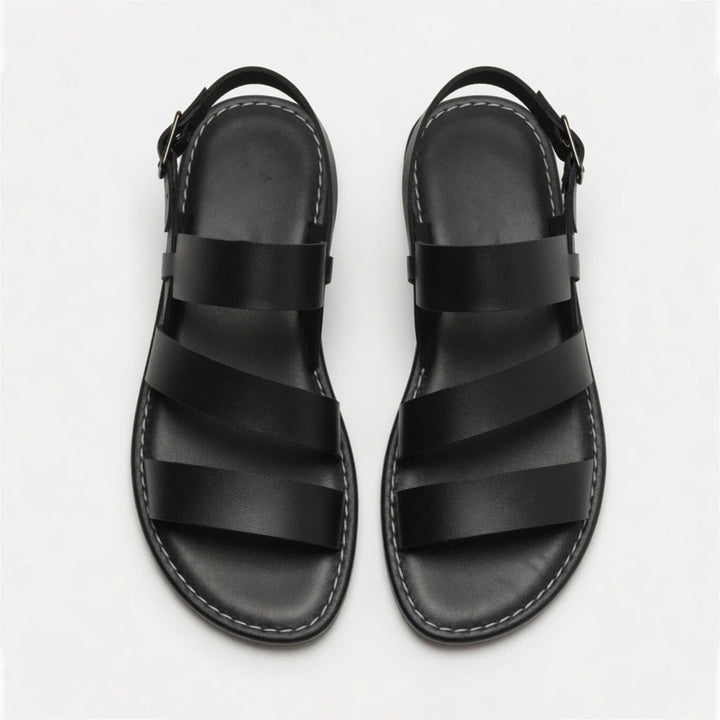 Fashionable women's open-toe flat sandals, crossover strap design, perfect for everyday chic.