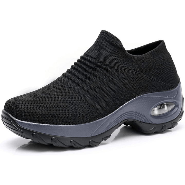 Close-up of women's orthopedic shoes, highlighting plush cushioning and ergonomic arch support for ultimate comfort.