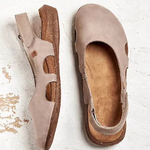 Stylish women's orthopedic sandals with adjustable straps & cushioned arch support for summer comfort.