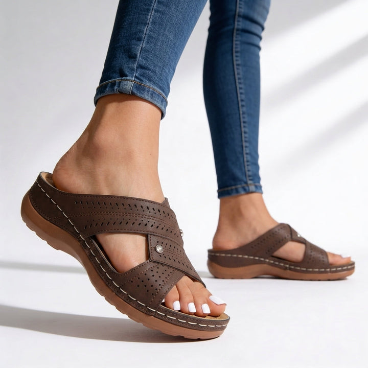 Women's cushioned wedge sandals with crossover straps, peep toe, and slip-on design for comfortable summer walking.