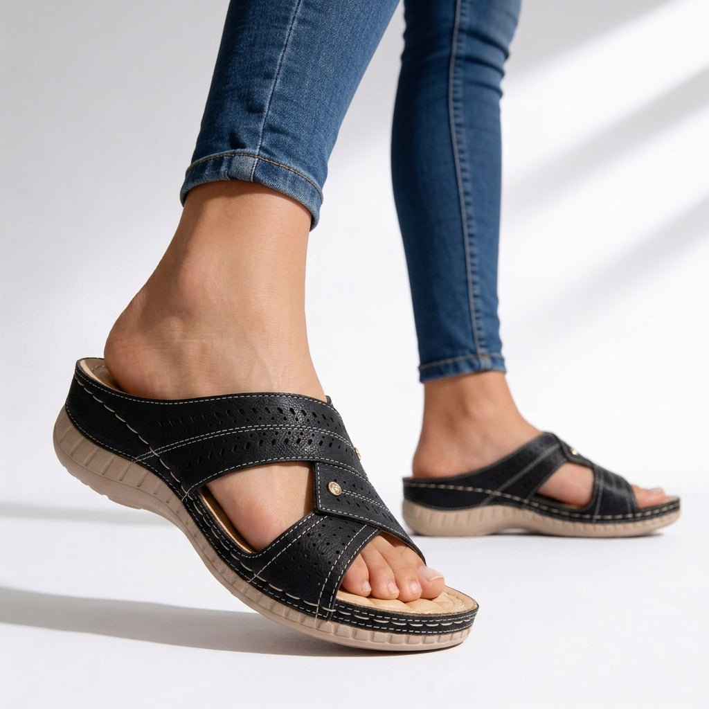 Versatile women's slip-on wedge sandals featuring a cushioned sole, crossover straps, and a chic peep toe.