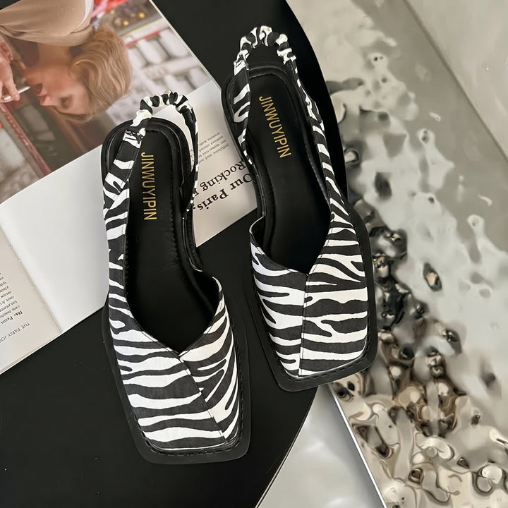 Chic women's square toe slingback block heel sandals, offering comfort and style for everyday summer outfits.