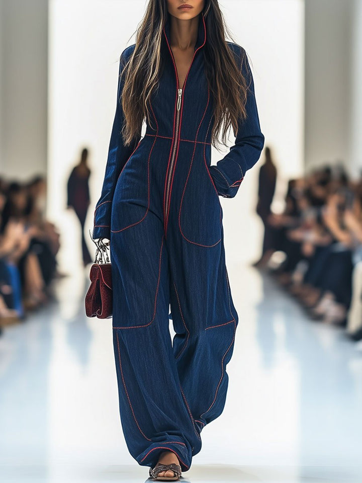 Women's dark blue wide leg jumpsuit with long sleeve zip front. Casual elegance & modern style.