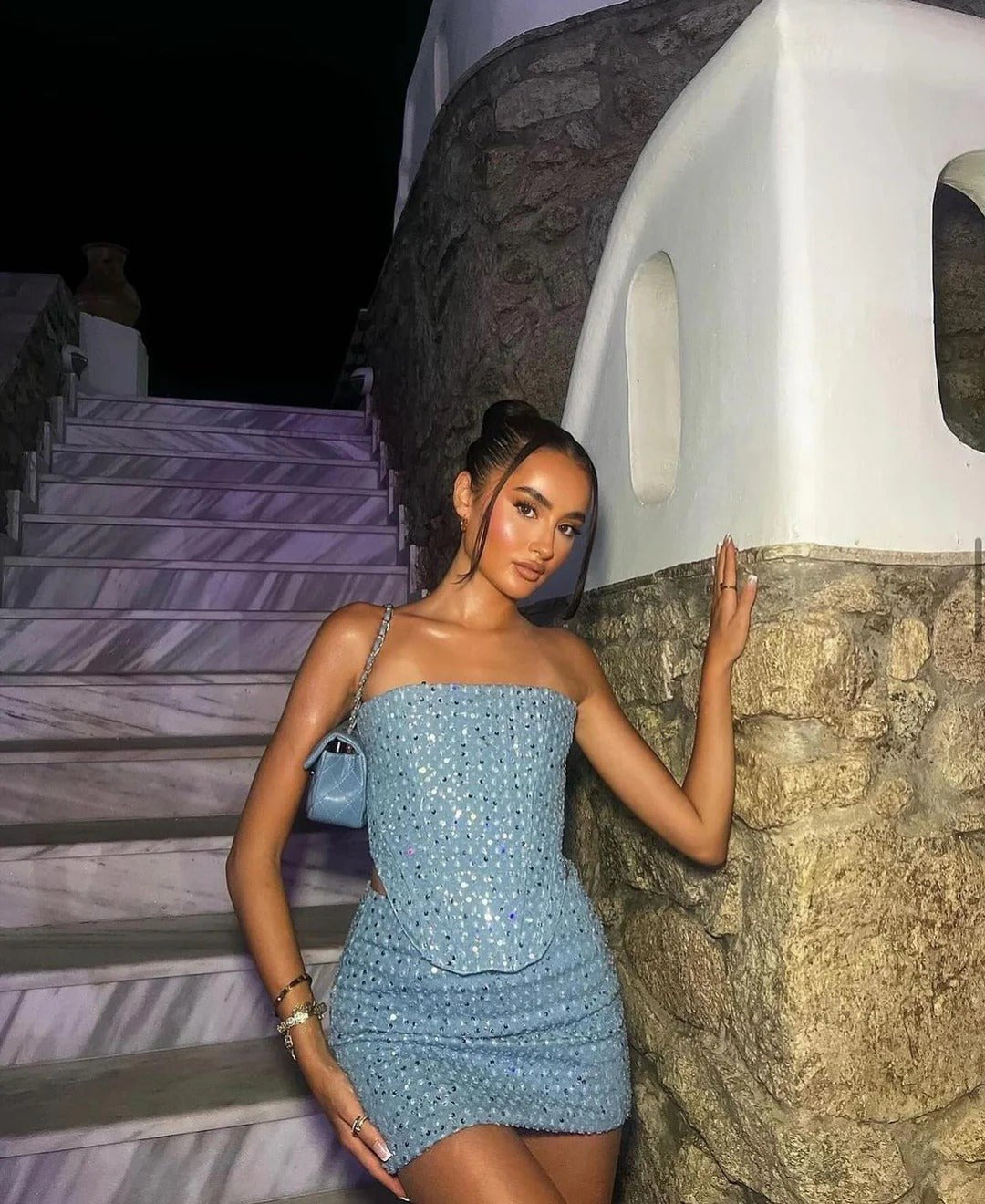 Elegant women's blue sequin mini dress. Strapless bodycon design, ideal for evening wear & formal events.