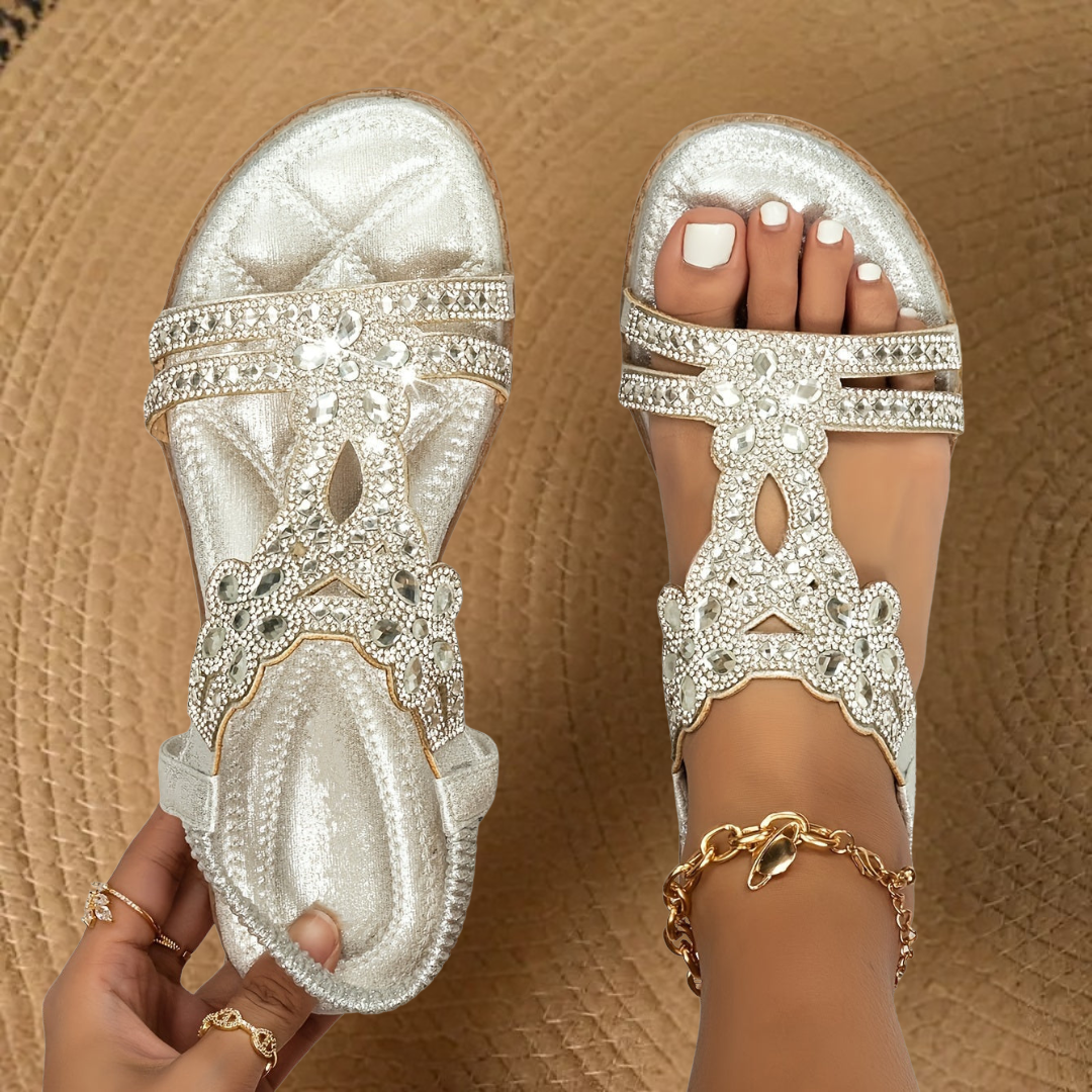 Sparkling rhinestone detailed flat sandals for women, great for casual summer outfits.