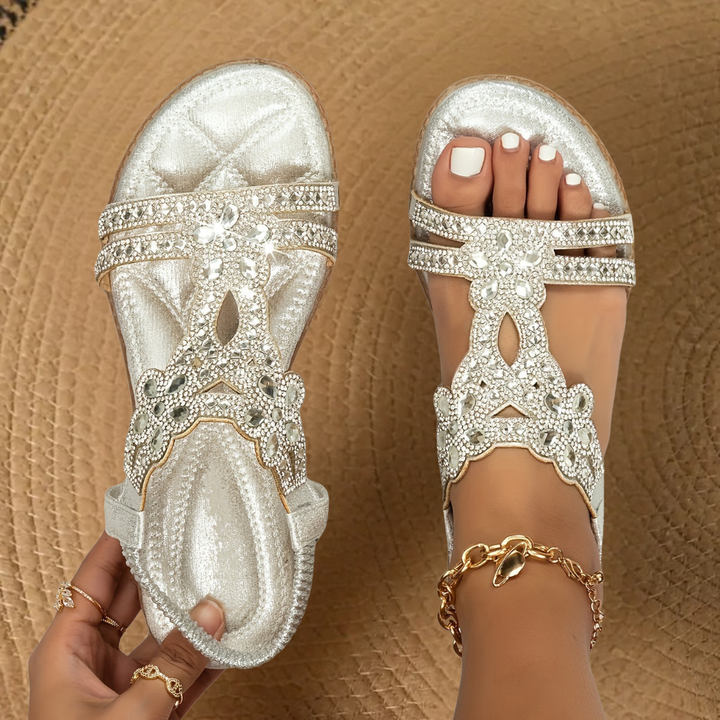 Sparkling rhinestone detailed flat sandals for women, great for casual summer outfits.