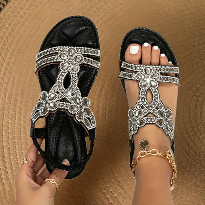 Easy slip-on women's rhinestone flat sandals, your go-to comfortable vacation shoes.