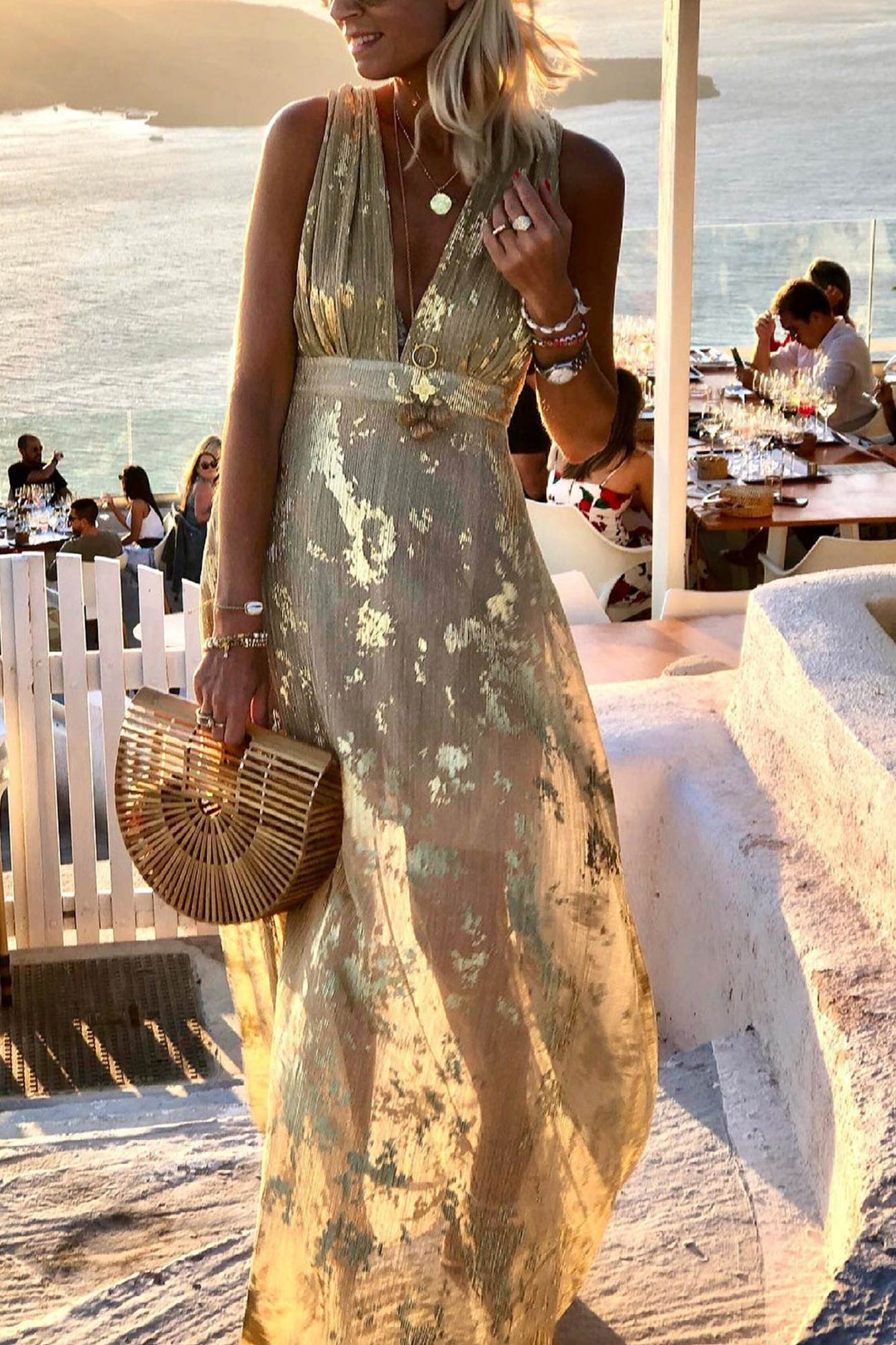 Casual chic women's deep V-neck tank dress, perfect for summer parties or vacation wear, golden star print.