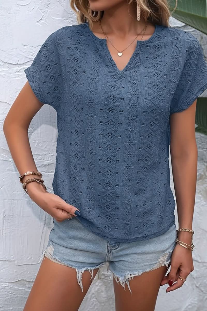 Casual women's eyelet top with a delicate design and flattering notched neckline for everyday style.