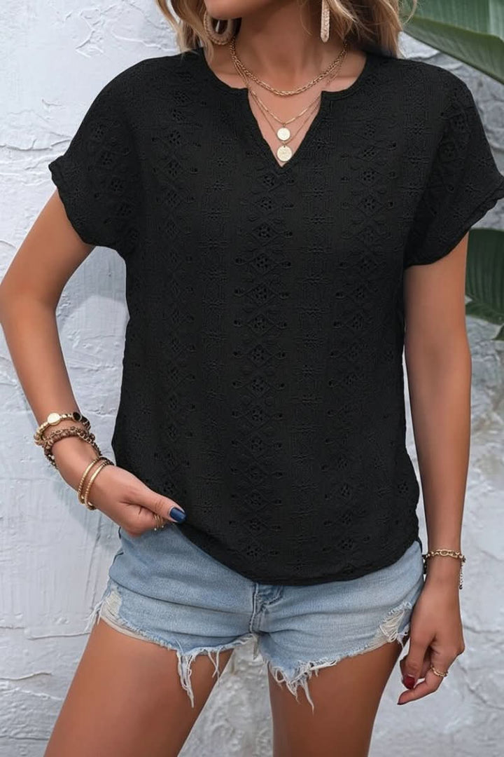 Women's casual eyelet t-shirt, perfect for summer, with a delicate embroidered pattern and notched v-neck.
