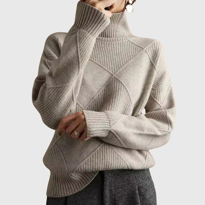 Women's oversized roll neck jumper, long sleeve and cozy for ultimate winter comfort.