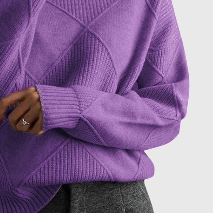 Comfortable women's long sleeve roll neck sweater, ideal for cozy winter fashion.