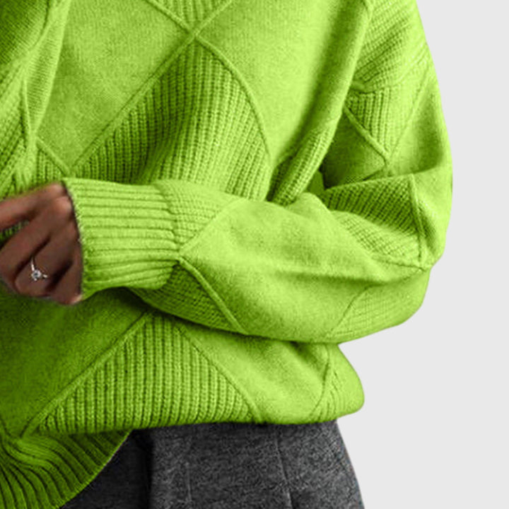 Cozy knit women's roll neck jumper, oversized fit for ultimate comfort and winter warmth.