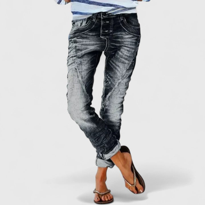 Black distressed wide leg denim jeans for women, mid-rise, vintage-inspired casual wear.