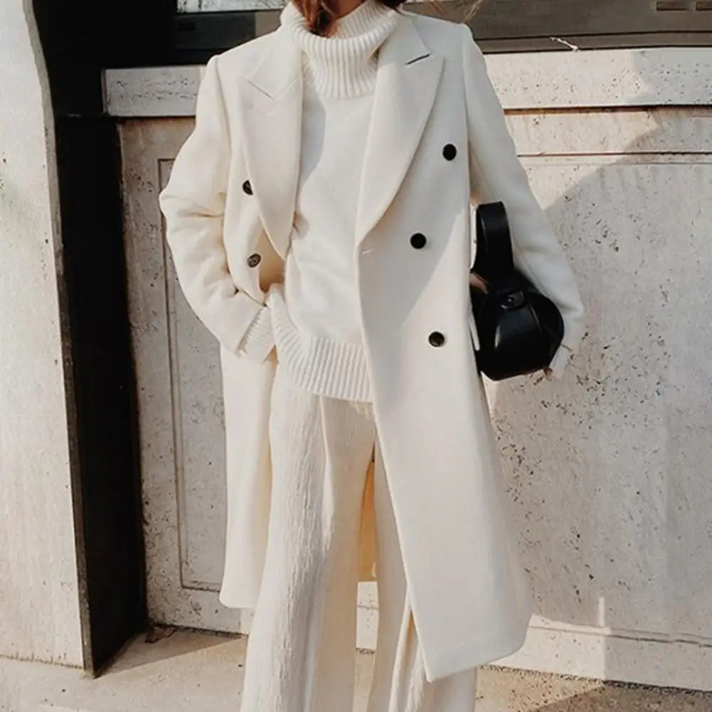 Polished women's double-breasted trench coat, ideal professional workwear and comfortable office attire for ladies.