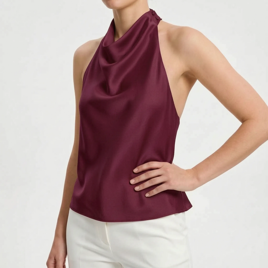 Elegant sleeveless women's draped halter top, chic backless design for summer parties.