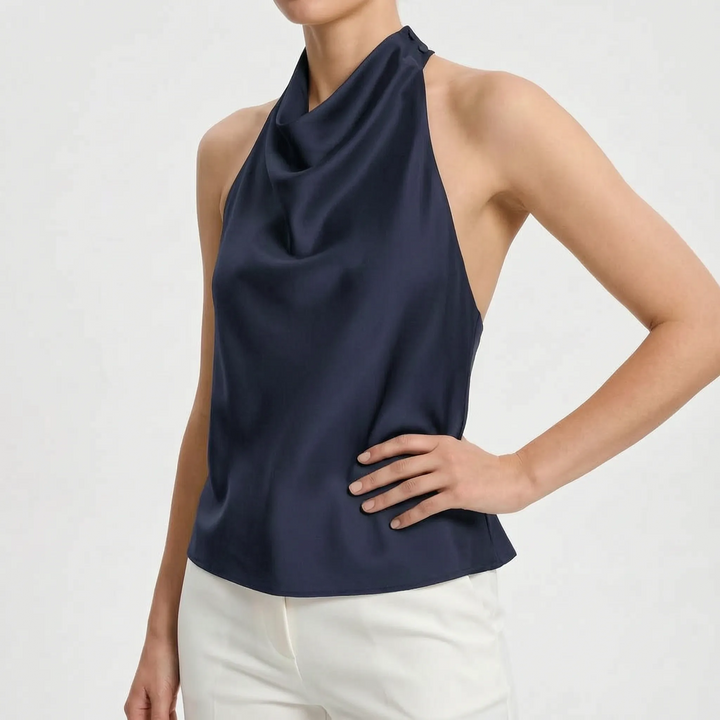 Sophisticated women's halter top with elegant draped neckline, sleeveless for evening chic.