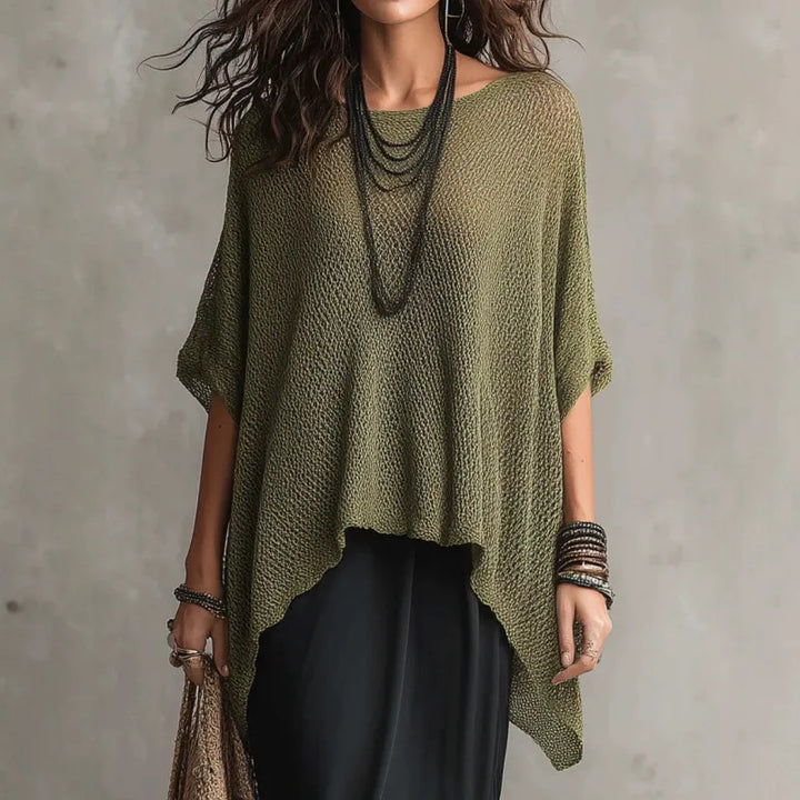 Stylish women's draped poncho top, featuring a boat neck & oversized fit. Versatile casual blouse for modern chic.