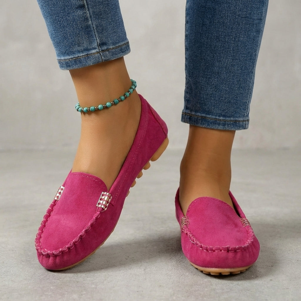 Stylish women's slip-on loafers, perfect for driving, featuring a chic metallic detail.