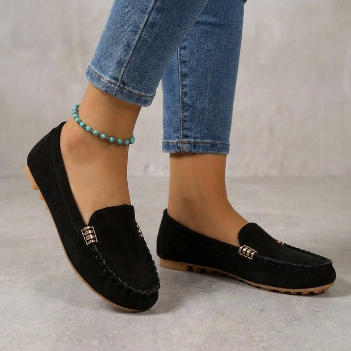 Versatile women's slip-on comfort shoes, driving moccasins with elegant metallic detail.
