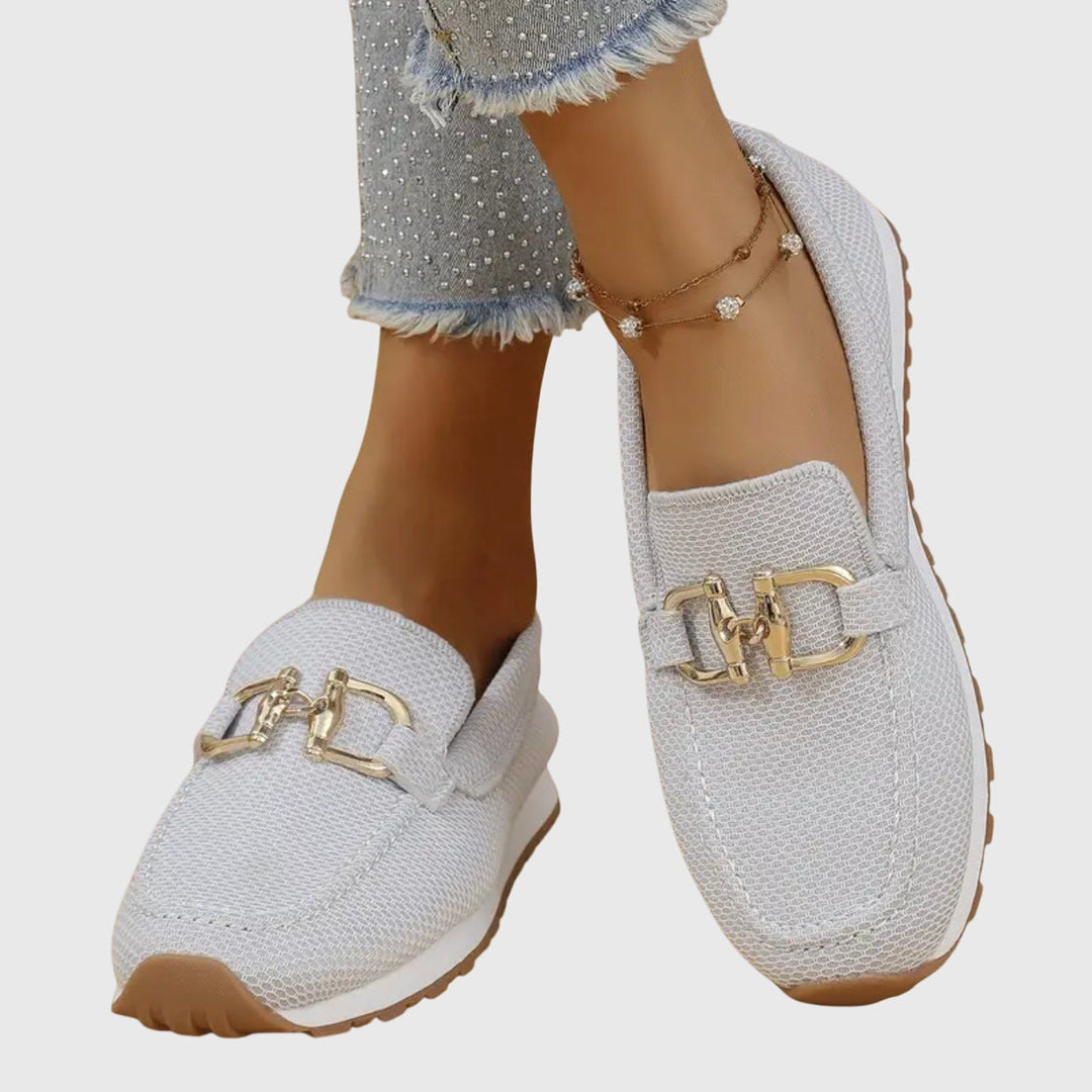 Classic dusty blue horsebit loafers for women. Comfortable slip-on flats with a cushioned sole & elegant style.