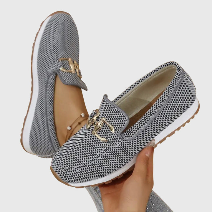 Step into comfort with these dusty blue women's horsebit loafers. Slip-on flats with a cushioned sole for elegant ease.