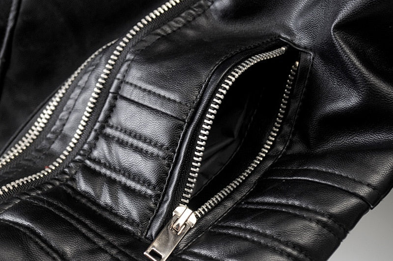 Close-up of a women's edgy black two-tone biker jacket, highlighting unique design and versatile style.