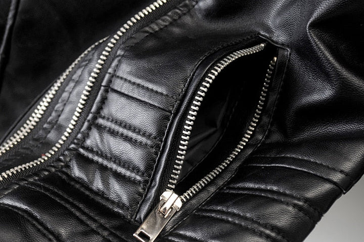 Close-up of a women's edgy black two-tone biker jacket, highlighting unique design and versatile style.
