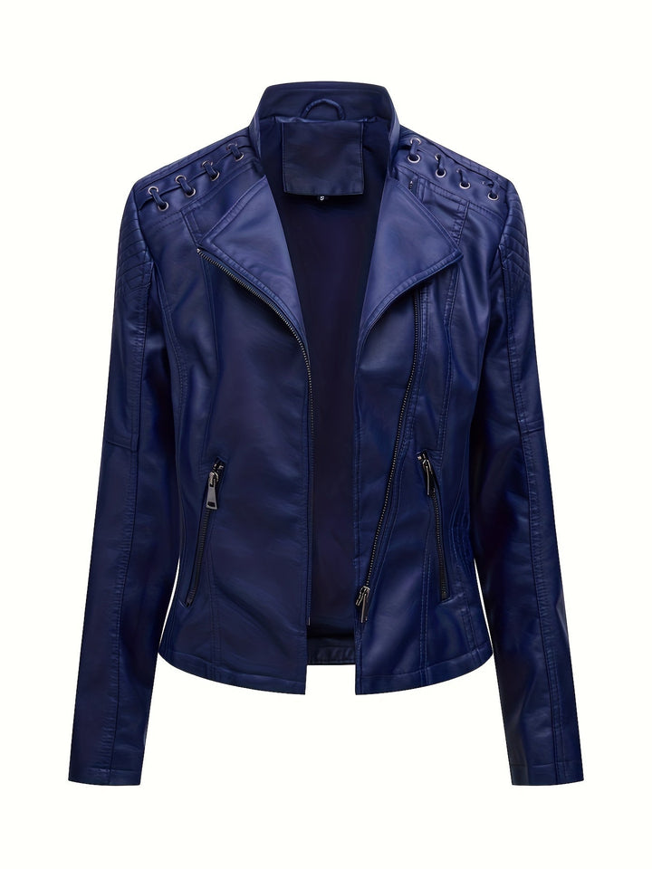 Woman posing in a women's edgy moto jacket with studded details and an asymmetric zip closure.