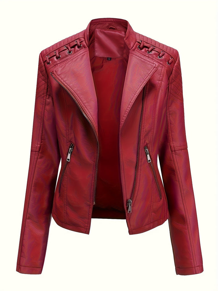 Woman wearing a black studded moto jacket, perfect for edgy fashion and outerwear.