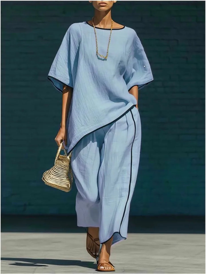 Women's effortless blue two-piece set with comfortable cropped wide-leg pants and matching top for casual wear.