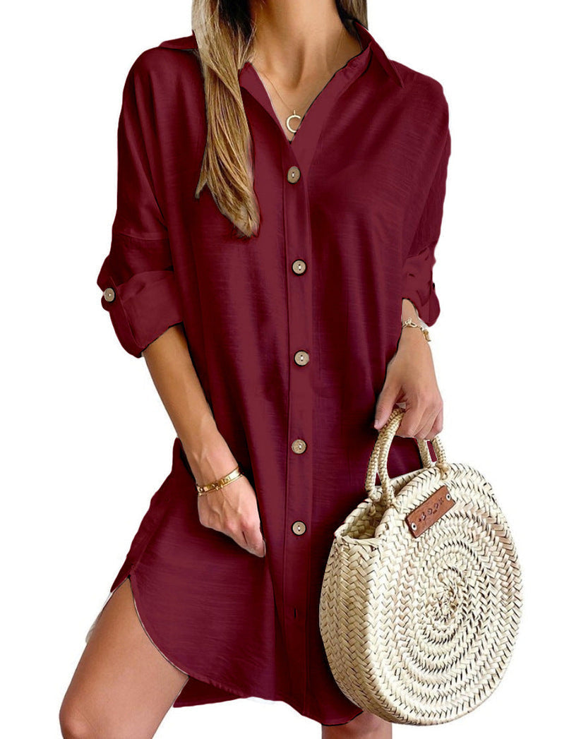Pink casual women's short dress. Effortless button-down shirt dress with roll-tab sleeves, versatile for any day.