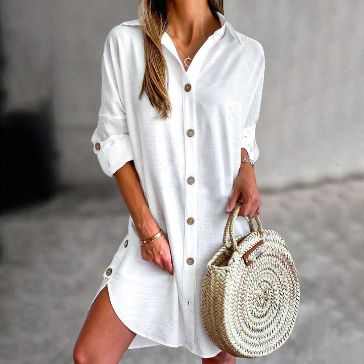White women's button-down shirt dress. Casual summer short dress with roll-tab sleeves, perfect for beach.