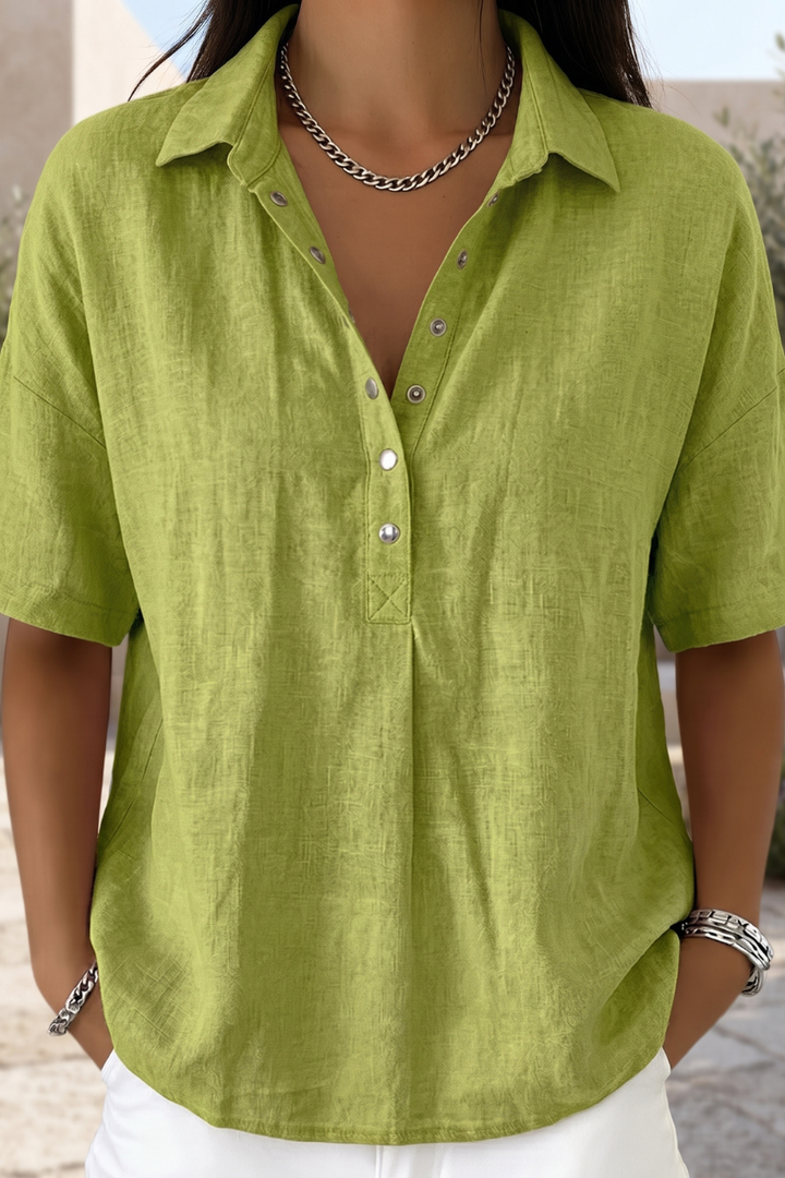 Sophisticated women's long-sleeve button-up blouse, an elegant fashion top for professional office wear.