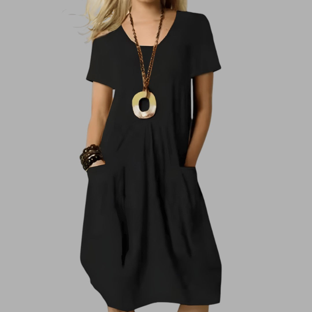 Effortless women's casual midi dress, great for everyday style. Comfortable & versatile for spring, summer, or day wear.