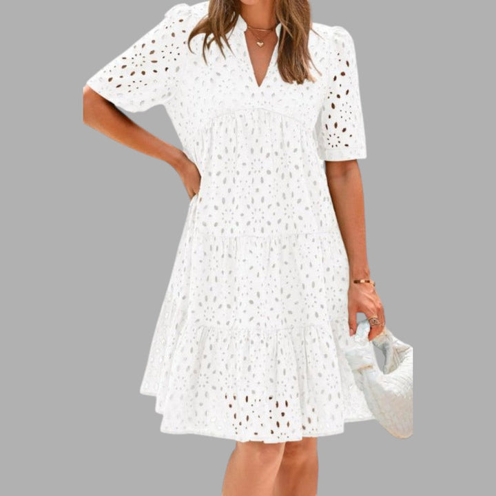 Women's effortless casual mini dress, comfortable loose fit short sleeve for everyday wear.