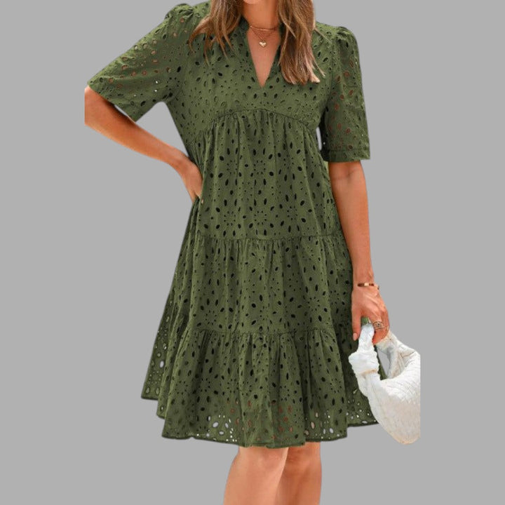 Comfortable loose fit women's mini dress with short sleeves, ideal for warm summer days.