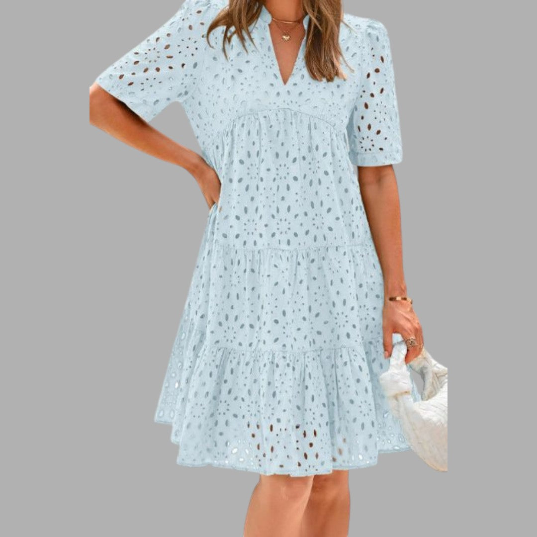 Stylish women's loose fit casual mini dress, short sleeve design for effortless summer comfort.
