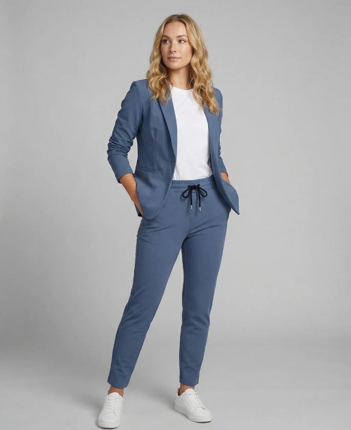 Casual women's suit set. Chic two-piece blazer and pants perfect for elegant fashion, workwear, or versatile attire.